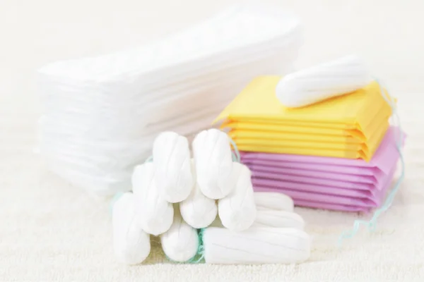 Do Sanitary Napkins Contain Fluorescent Whitening Agents?